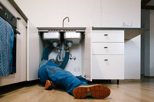 Professional Emergency Plumber technician working in Derby, KS